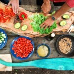 person holding sliced vegetable