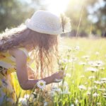 girl picking flowers