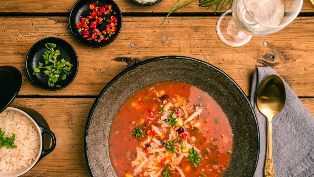black ceramic bowl with soup