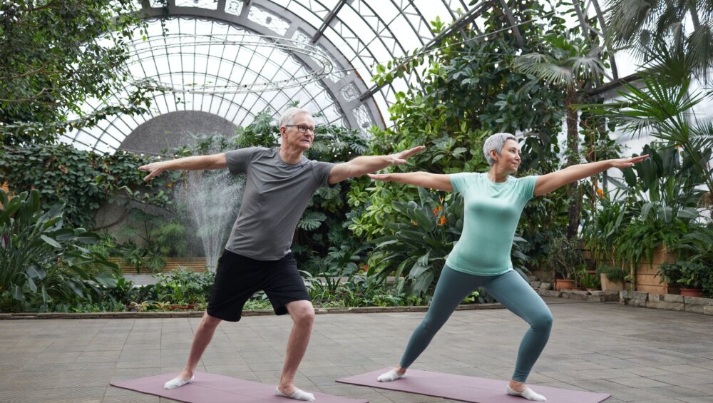 couple practicing yoga