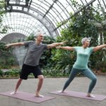 couple practicing yoga